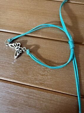Turquoise Cord Necklace with Silver Butterfly Accent